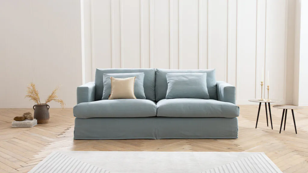 Hussensofa Pittori in blauem Stoff