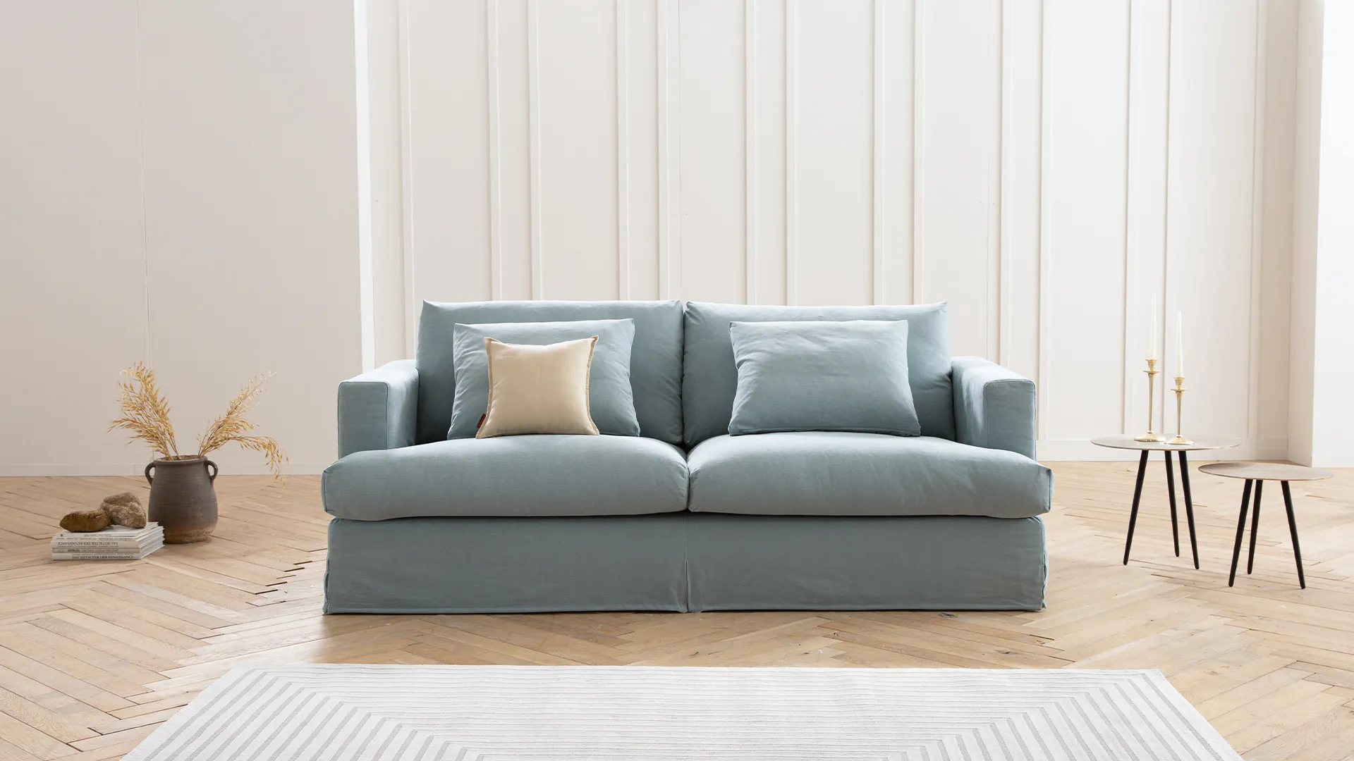 Hussensofa Pittori in blauem Stoff